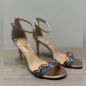 Jewel Badgley Mischka Heeled Sandals in Rose Gold with some accent colors.